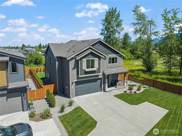 208 Hovey St, Buckley, WA 98321 - view of front of house featuring concrete driveway and an attached garage