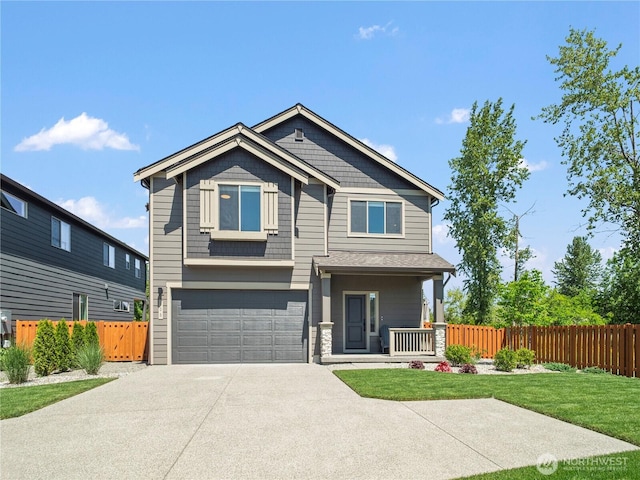 208 Hovey St, Buckley, WA 98321 - craftsman-style house with a porch, concrete driveway, and an attached garage