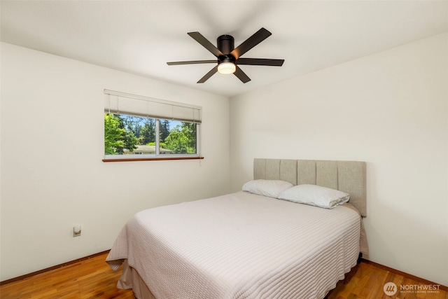 1981 Sequoia St SE, Port Orchard, WA 98366 - bedroom featuring wood finished floors, baseboards, and a ceiling fan