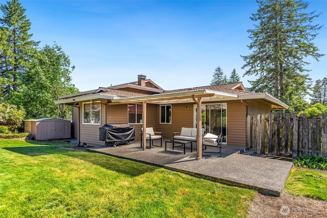 1981 Sequoia St SE, Port Orchard, WA 98366 - back of property featuring a patio and outdoor lounge area