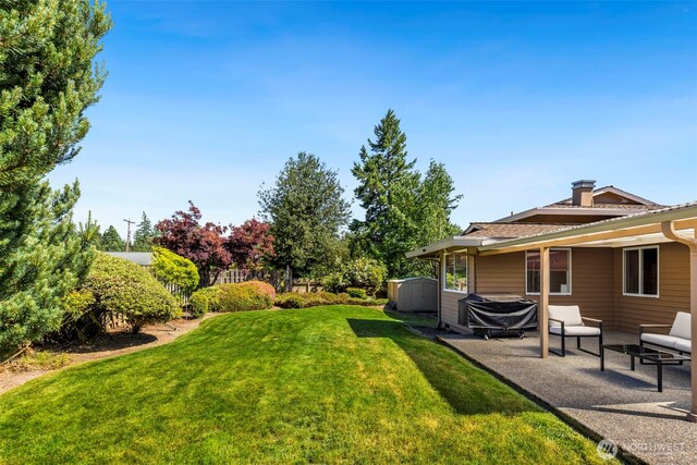 1981 Sequoia St SE, Port Orchard, WA 98366 - view of green lawn with a patio and an outdoor hangout area