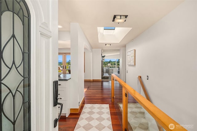 7440 SE 32nd St, Mercer Island, WA 98040 - hall with a skylight, dark wood finished floors, and french doors