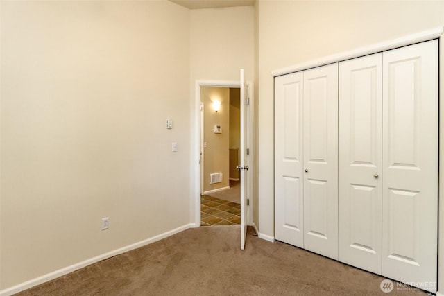 5513 Starlight St E, Fife, WA 98424 - unfurnished bedroom featuring light carpet, a closet, and baseboards