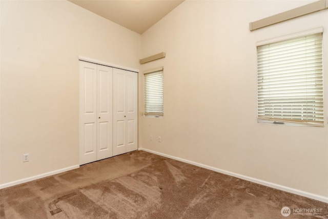 5513 Starlight St E, Fife, WA 98424 - unfurnished bedroom with carpet floors, baseboards, and a closet