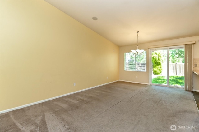 5513 Starlight St E, Fife, WA 98424 - carpeted spare room with a chandelier, baseboards, and vaulted ceiling