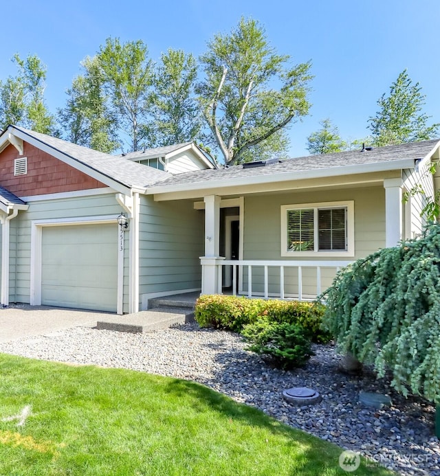 5513 Starlight St E, Fife, WA 98424 - view of front of home with a garage and roof with shingles