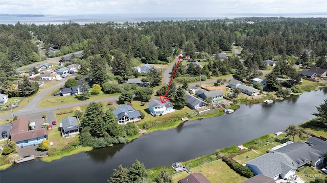 393 Canal Dr SE, Ocean Shores, WA 98569 - view of property location featuring nearby suburban area, a large body of water, and a forest