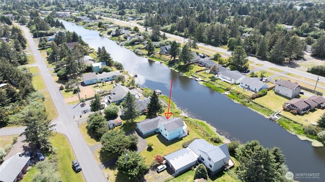 393 Canal Dr SE, Ocean Shores, WA 98569 - aerial view of property's location with a large body of water and nearby suburban area