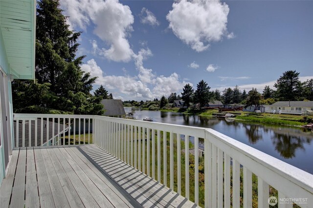 393 Canal Dr SE, Ocean Shores, WA 98569 - deck featuring a water view
