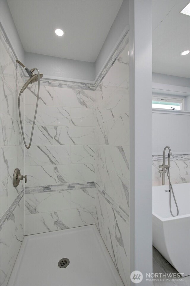 393 Canal Dr SE, Ocean Shores, WA 98569 - bathroom with a freestanding bath, a shower stall, and recessed lighting