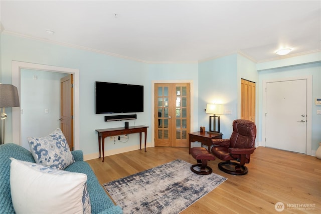 1501 Tacoma Ave S Unit 212, Tacoma, WA 98402 - living area featuring french doors, ornamental molding, and wood finished floors