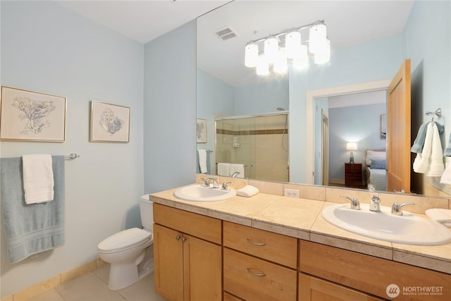 1501 Tacoma Ave S Unit 212, Tacoma, WA 98402 - full bath featuring tile patterned floors, a shower stall, ensuite bath, toilet, and double vanity