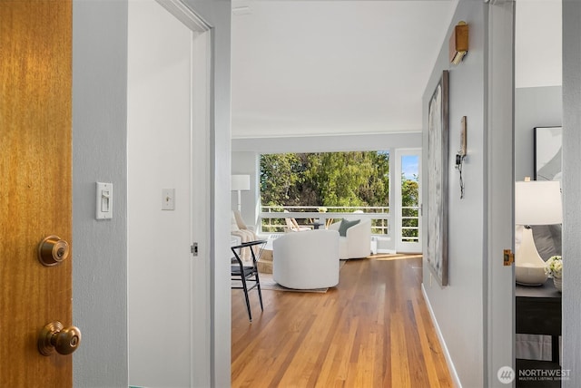 530 W Olympic Pl Unit 406, Seattle, WA 98119 - hall featuring wood finished floors