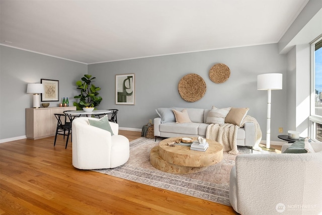 530 W Olympic Pl Unit 406, Seattle, WA 98119 - living area with wood finished floors and baseboards