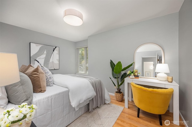 530 W Olympic Pl Unit 406, Seattle, WA 98119 - bedroom with wood finished floors