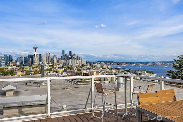 530 W Olympic Pl Unit 406, Seattle, WA 98119 - balcony with a view of skyline and a water view