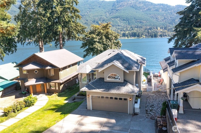 562 W Lake Samish Dr, Bellingham, WA 98229 - water view featuring a mountainous background and a forest