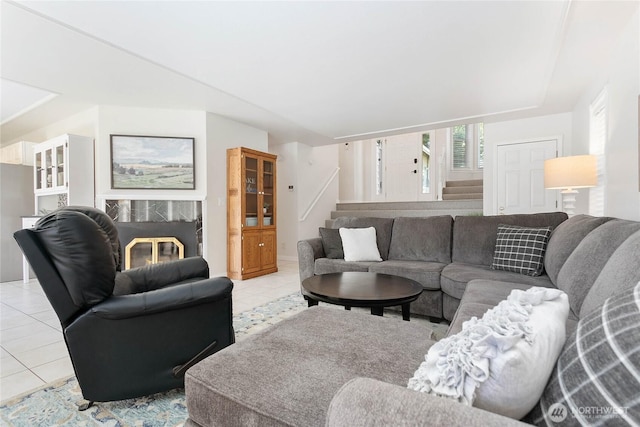 562 W Lake Samish Dr, Bellingham, WA 98229 - living area featuring stairs, light tile patterned floors, and baseboards
