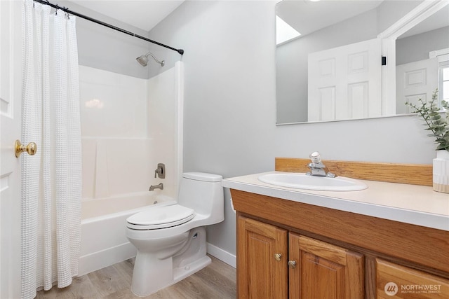 562 W Lake Samish Dr, Bellingham, WA 98229 - bathroom featuring vanity, shower / bath combination with curtain, toilet, and wood finished floors