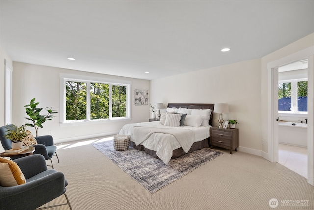 15001 NE 8th St, Bellevue, WA 98007 - bedroom with multiple windows, light colored carpet, recessed lighting, and baseboards
