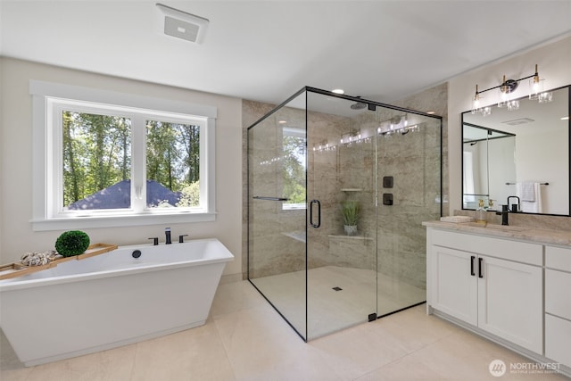 15001 NE 8th St, Bellevue, WA 98007 - bathroom with vanity, a freestanding bath, tile patterned flooring, and a stall shower