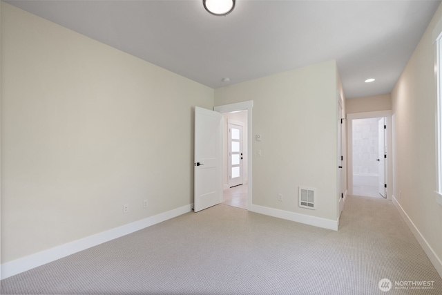15001 NE 8th St, Bellevue, WA 98007 - unfurnished room featuring baseboards, light carpet, and recessed lighting