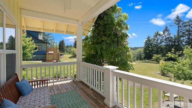 10539 N Madison Ave NE, Bainbridge Island, WA 98110 - wooden deck with a lawn and ceiling fan