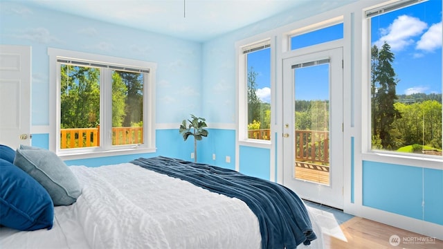 10539 N Madison Ave NE, Bainbridge Island, WA 98110 - bedroom with access to exterior and multiple windows