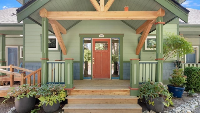 10539 N Madison Ave NE, Bainbridge Island, WA 98110 - view of exterior entry with a shingled roof and a porch