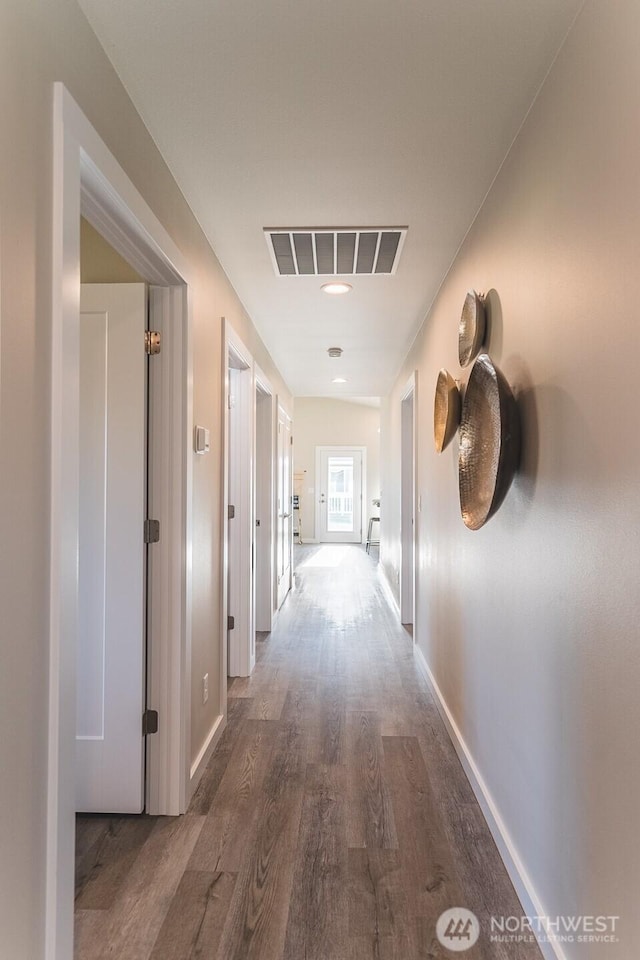123 E 9th Ave Unit 67, Moses Lake, WA 98837 - hall with wood finished floors and baseboards