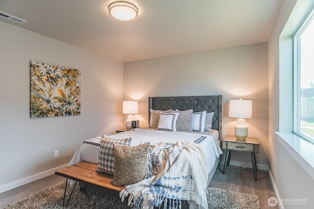 123 E 9th Ave Unit 67, Moses Lake, WA 98837 - bedroom with wood finished floors and baseboards