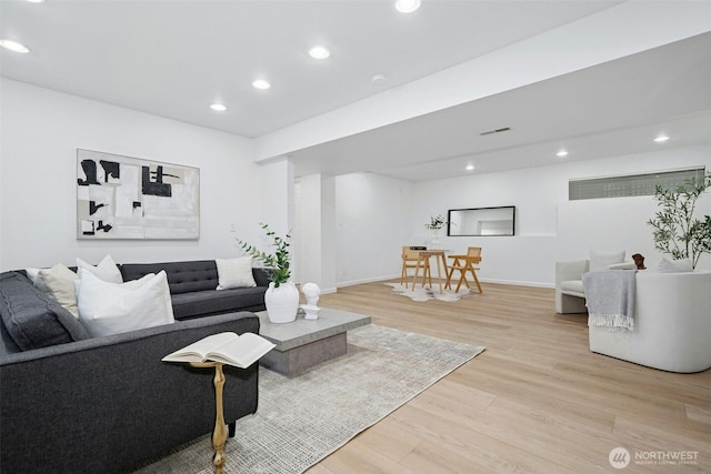 13206 SE 57th St, Bellevue, WA 98006 - living room with light wood-type flooring, recessed lighting, and baseboards