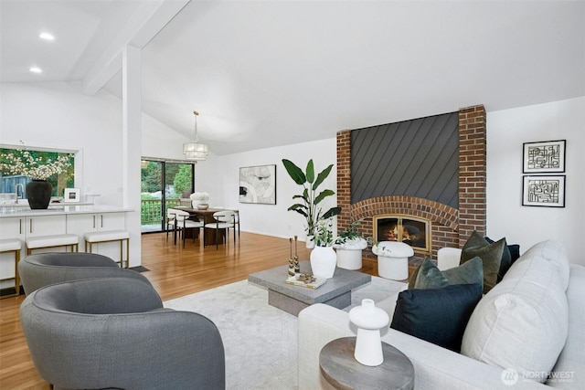 13206 SE 57th St, Bellevue, WA 98006 - living room featuring wood finished floors, a fireplace, and recessed lighting