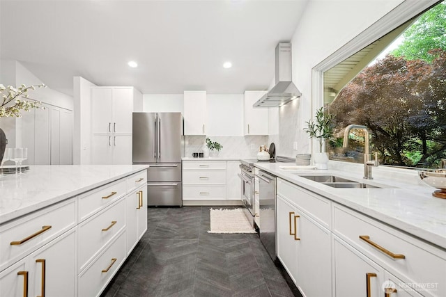 13206 SE 57th St, Bellevue, WA 98006 - kitchen featuring stainless steel appliances, wall chimney exhaust hood, a sink, light stone counters, and white cabinets