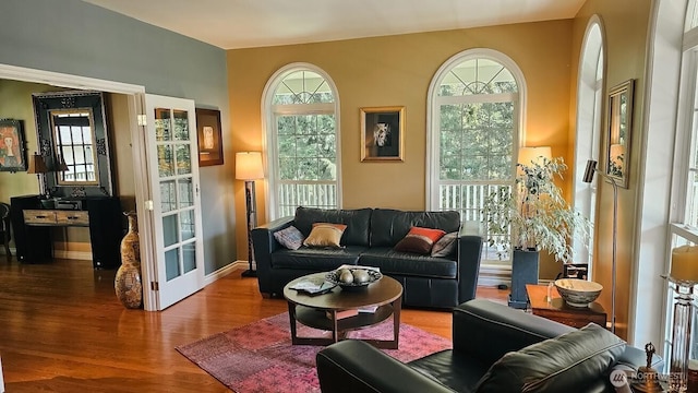 10920 Chaucer St SE, Olympia, WA 98501 - living room featuring wood finished floors and baseboards