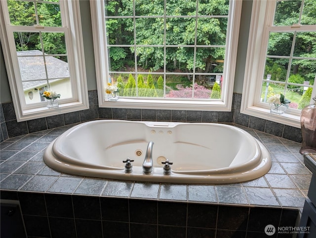 10920 Chaucer St SE, Olympia, WA 98501 - bathroom featuring tiled tub