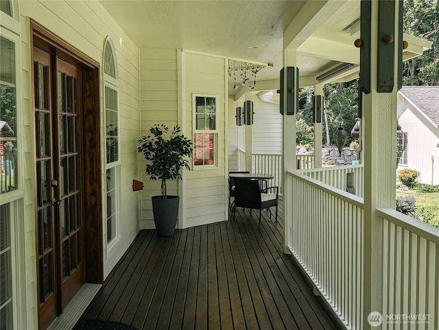 10920 Chaucer St SE, Olympia, WA 98501 - wooden porch featuring french doors