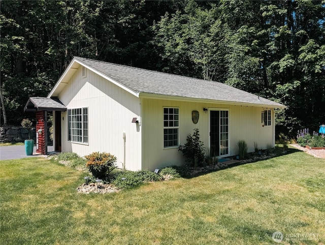 10920 Chaucer St SE, Olympia, WA 98501 - ranch-style house featuring a front yard and roof with shingles