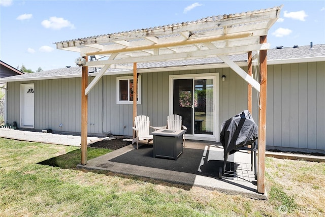 5601 Mount Tahoma Ct SE, Lacey, WA 98503 - back of house featuring an outdoor fire pit, a pergola, a patio area, and roof with shingles