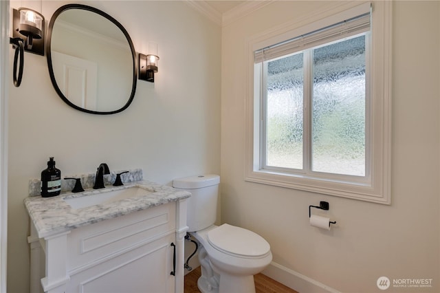 16710 Snohomish Ave, Snohomish, WA 98296 - bathroom with toilet, healthy amount of natural light, vanity, baseboards, and crown molding