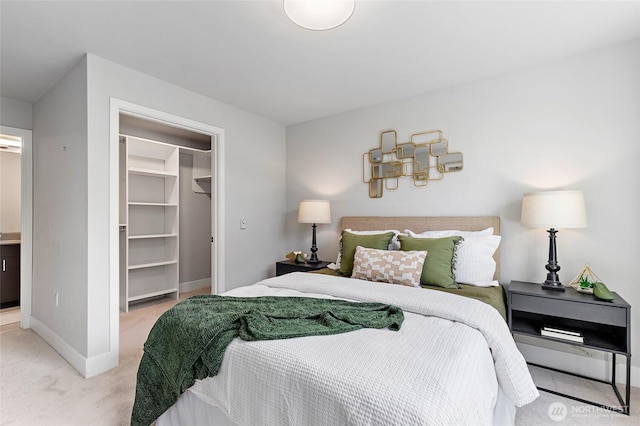 50 Pine St Unit 420, Edmonds, WA 98020 - carpeted bedroom with baseboards, a spacious closet, and a closet