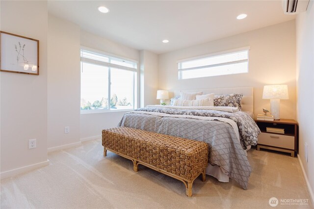 3620 W Mukilteo Blvd Unit E, Everett, WA 98203 - bedroom with a wall mounted air conditioner, light carpet, baseboards, and recessed lighting