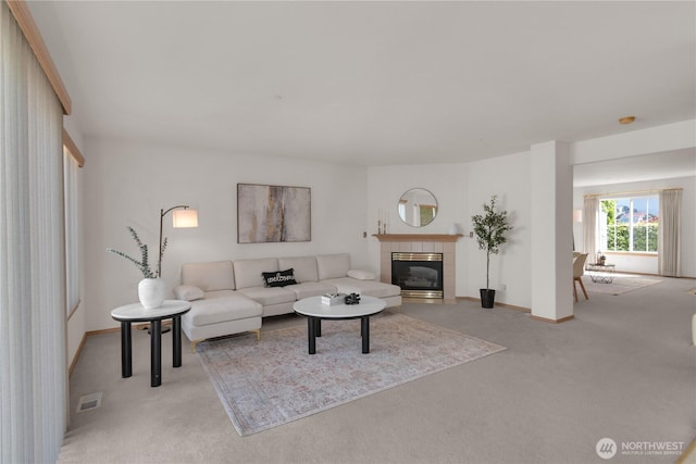 22111 96th Pl S, Kent, WA 98031 - carpeted living room with a tiled fireplace and baseboards