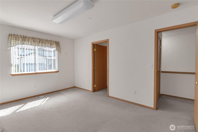 22111 96th Pl S, Kent, WA 98031 - empty room featuring light colored carpet, baseboards, and a smoke detector