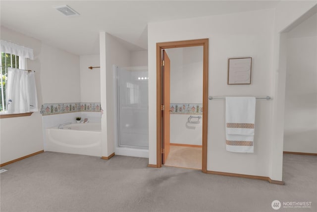 22111 96th Pl S, Kent, WA 98031 - bathroom featuring a bath, a shower stall, baseboards, and carpet