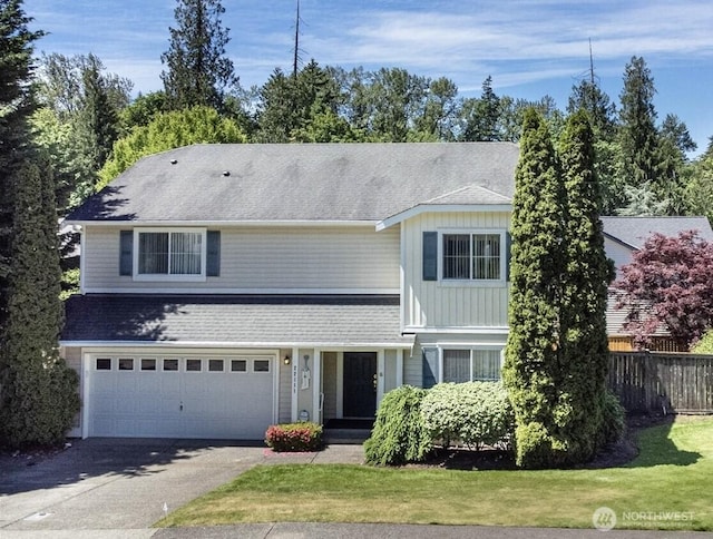 22111 96th Pl S, Kent, WA 98031 - traditional-style home with asphalt driveway, an attached garage, and roof with shingles