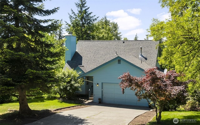 3861 Gala Loop, Bellingham, WA 98226 - view of front of property with driveway, an attached garage, a front yard, roof with shingles, and a chimney