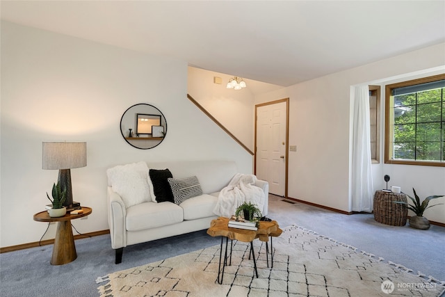 3861 Gala Loop, Bellingham, WA 98226 - living area featuring light carpet, baseboards, and a chandelier