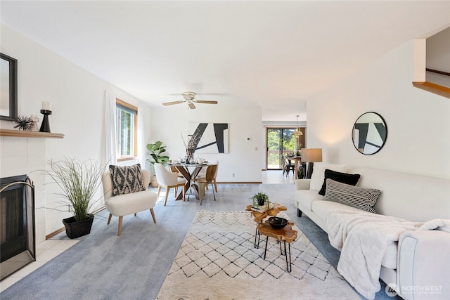 3861 Gala Loop, Bellingham, WA 98226 - living room featuring ceiling fan, a tile fireplace, and baseboards