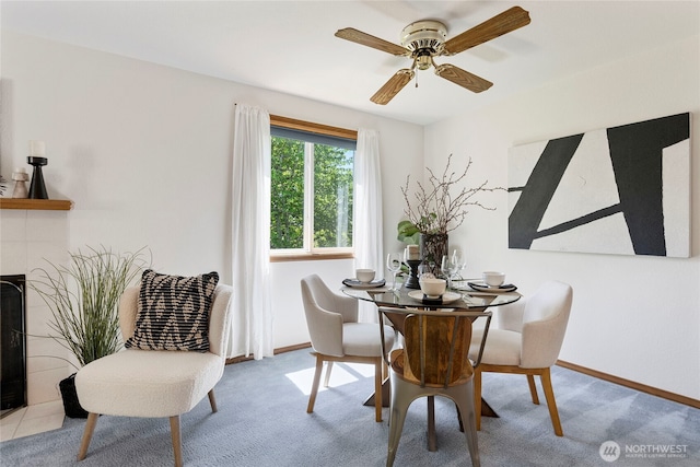 3861 Gala Loop, Bellingham, WA 98226 - dining space featuring baseboards, carpet floors, a ceiling fan, and a tile fireplace